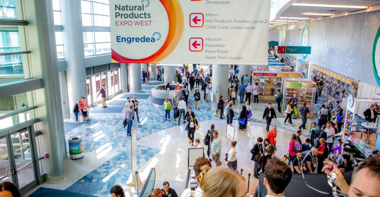 People walking around at natural products expo west