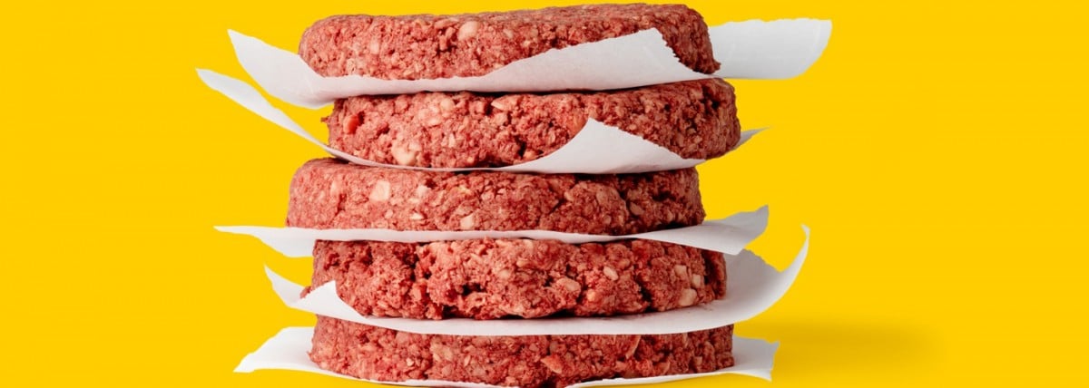 Stack of uncooked impossible burgers