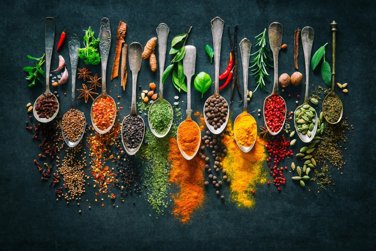 Spoons of spices and legumes