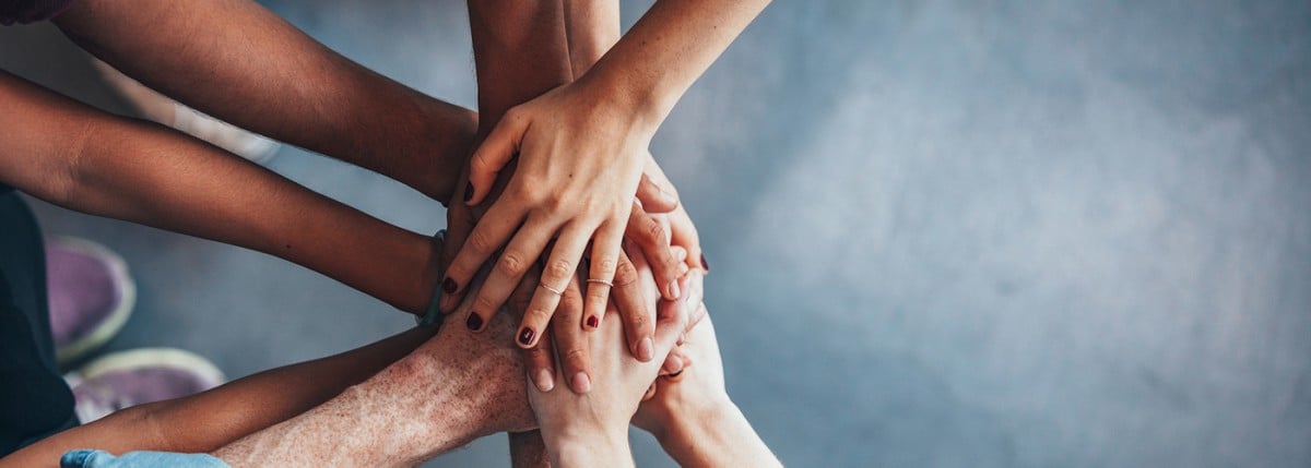 Hands in a stack