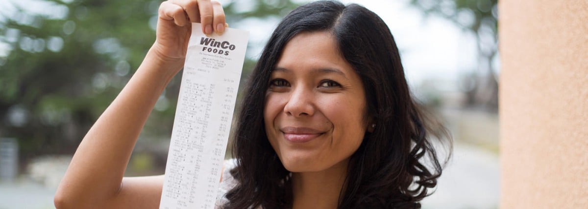 Person holding up winco receipt