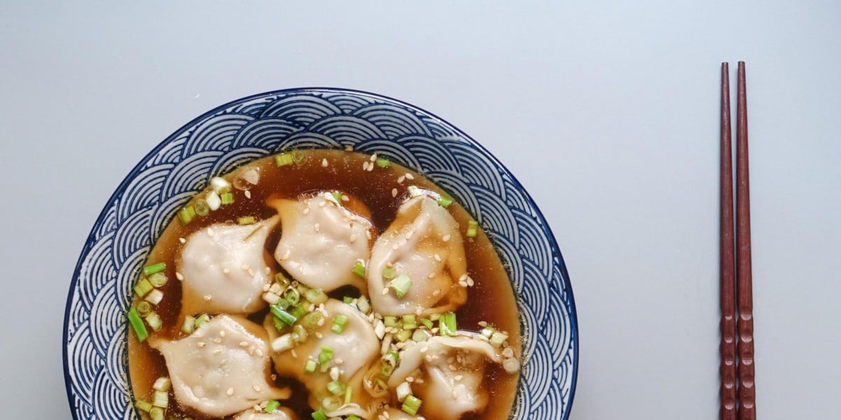 Plant-based dumplings in broth