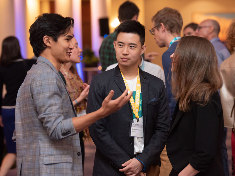 A group of people discuss alt proteins at the good food conference 2019 vip reception