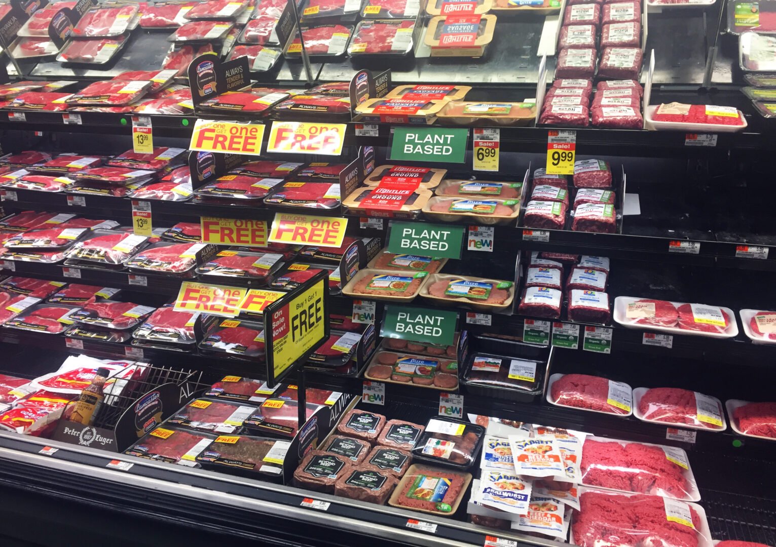 Plant-based meat in the meat aisle at acme markets