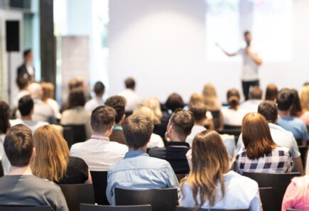 A crowd of students in a lecture hall