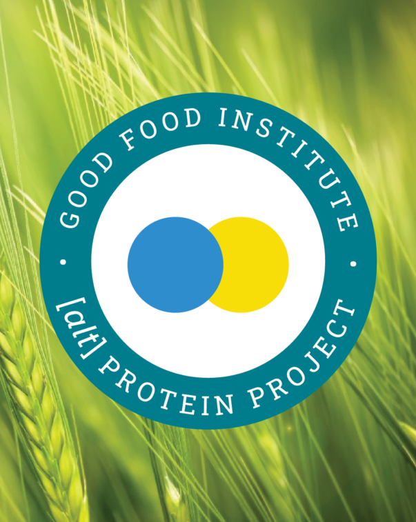 Alt protein project badge on a in front of a field of green wheat