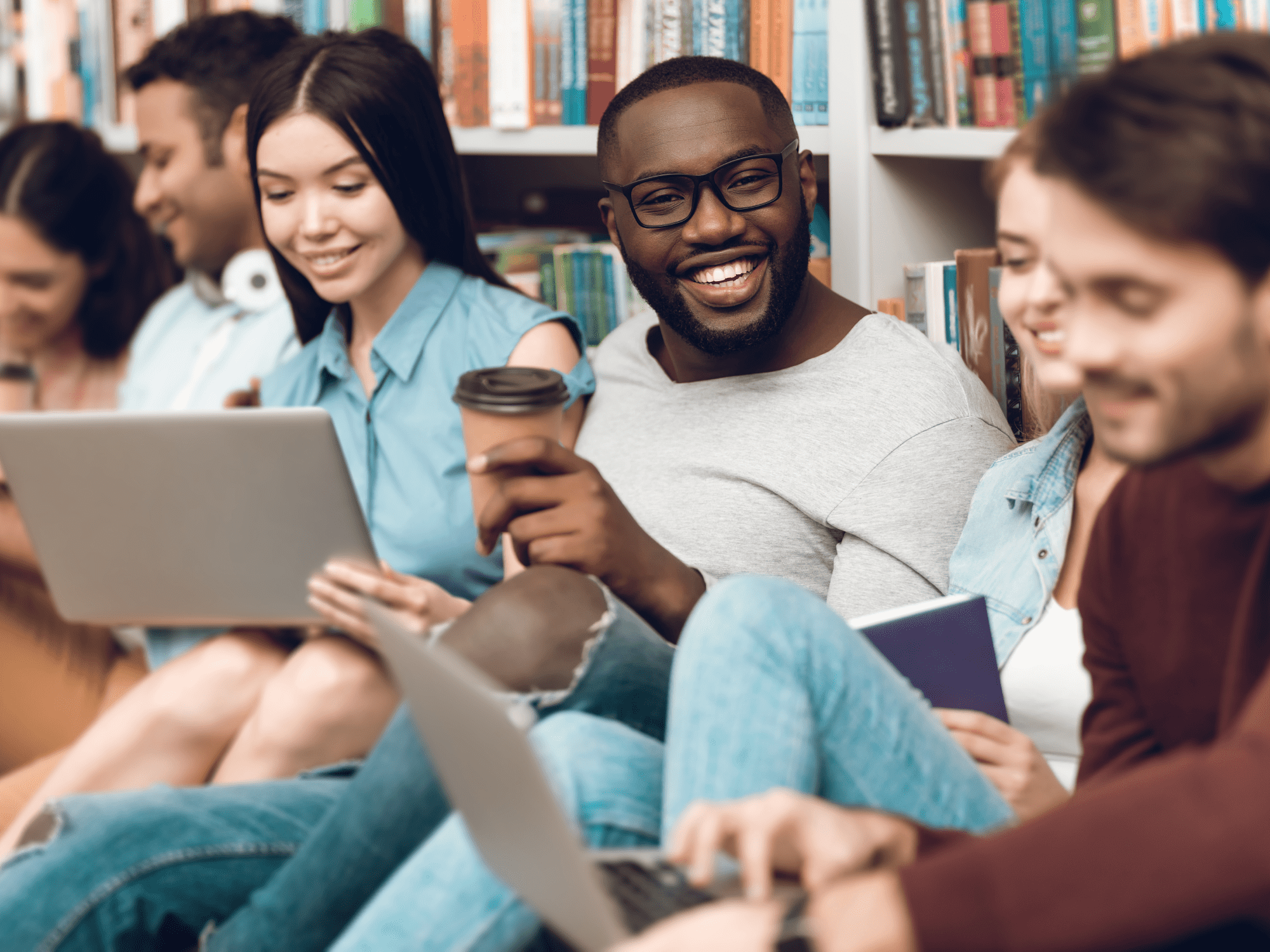 A photo of students conversing and studying