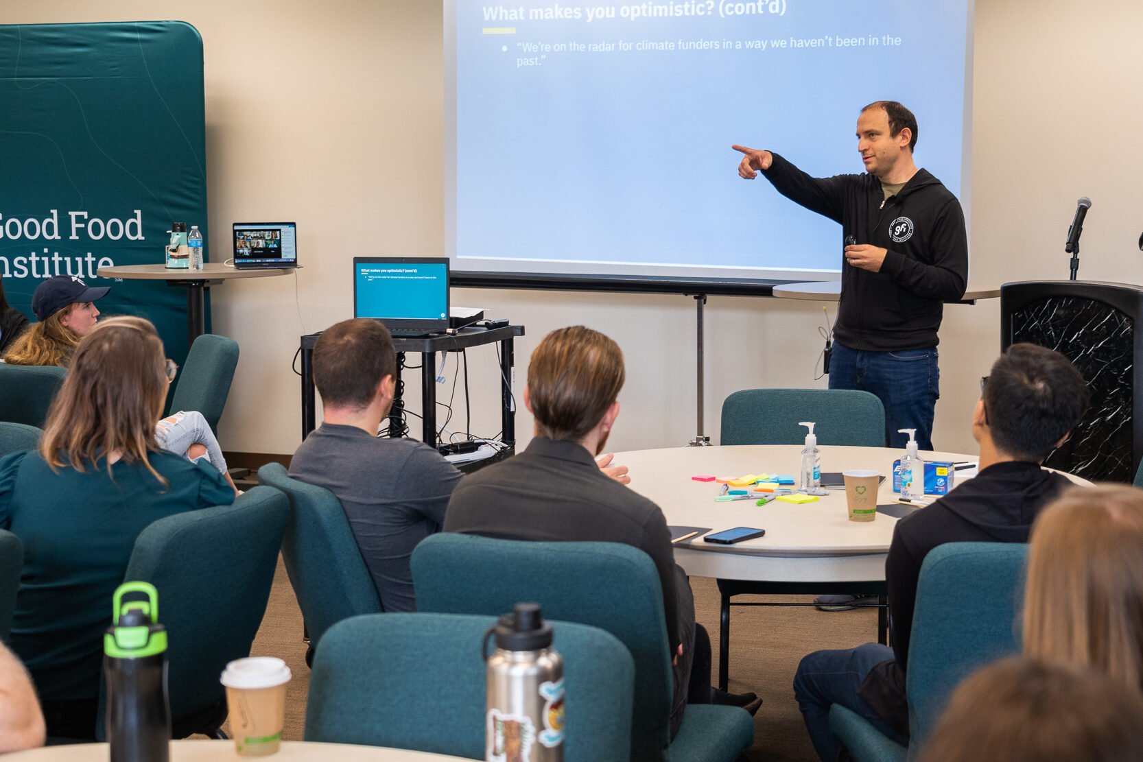 Ilya sheyman presents to a group of gfi staff