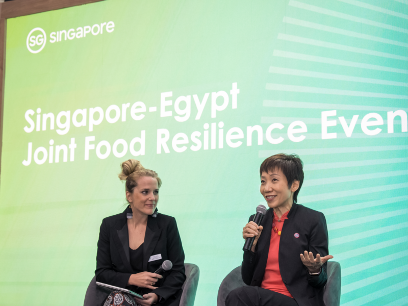 Two speakers during a fireside chat in singapore pavilion