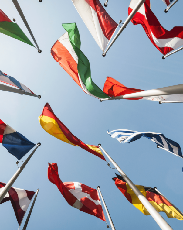 Flags against a blue sky