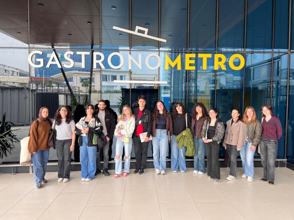 Members of the Yeditepe Alt Protein Project standing together outside a GastrOnometro building