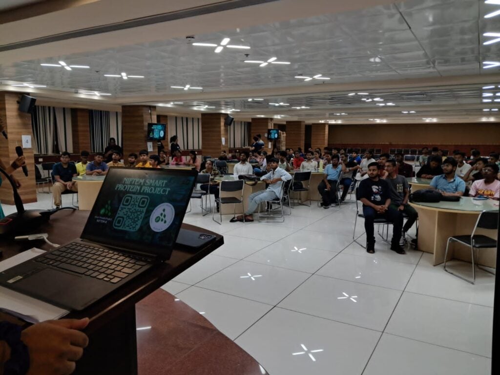 Classroom of students listening to a presentation