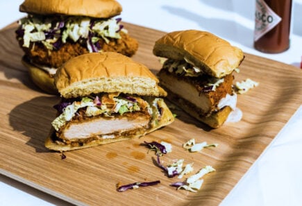 A tray of plant-based chicken sandwiches