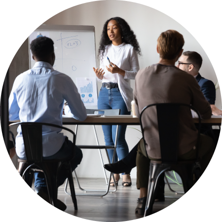 Request access: investor directory for companies 1 Businesswoman giving presentation to diverse colleagues in modern conference room