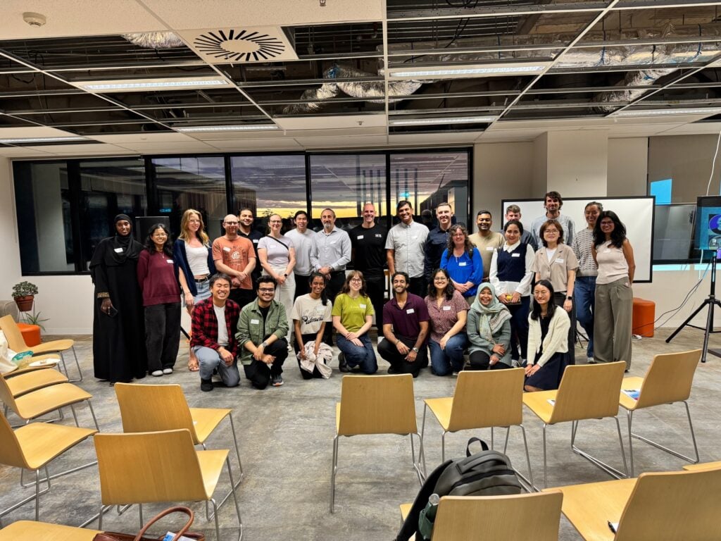 Monash Alt Protein Project members and event participants posing together in a classroom.