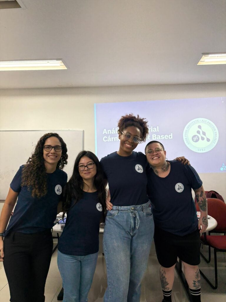 Four founders of the UFRJ Alt Protein Project standing together at an event