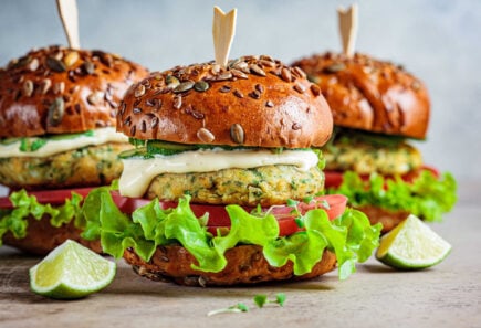 Close up of veggie burgers with vegetable toppings