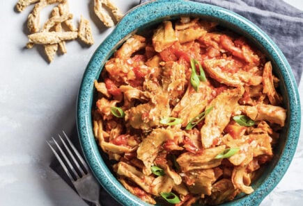 Plant-based chicken in a bowl with vegetables