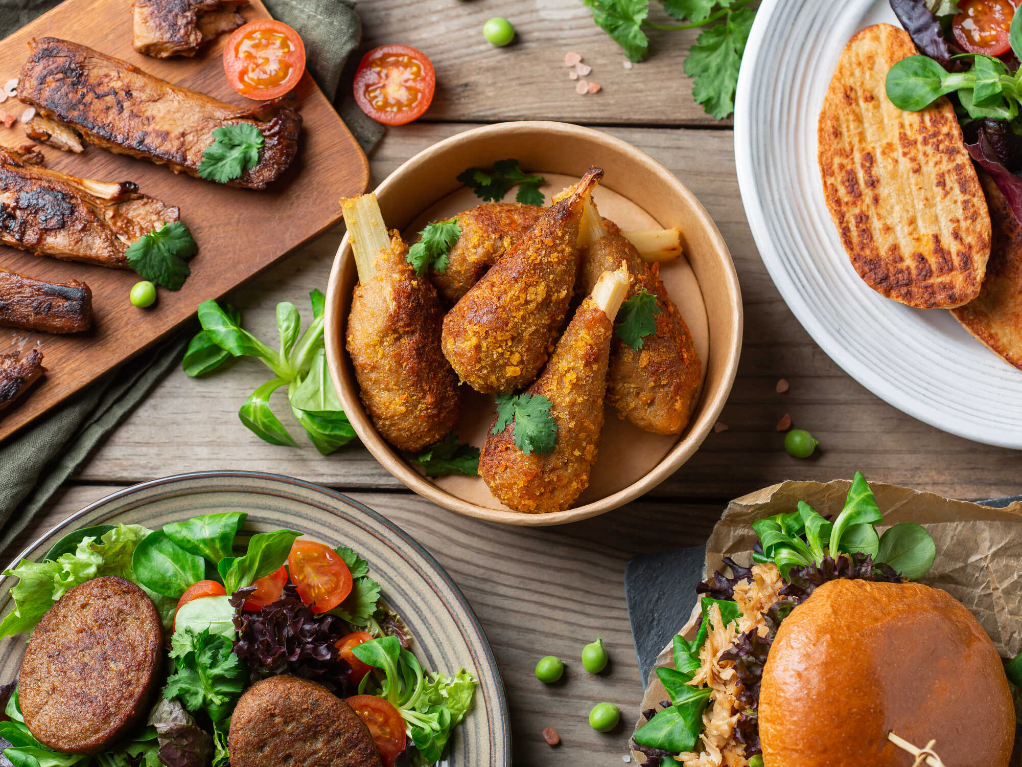 Top down view of a variety of plant based food and condiments on a table