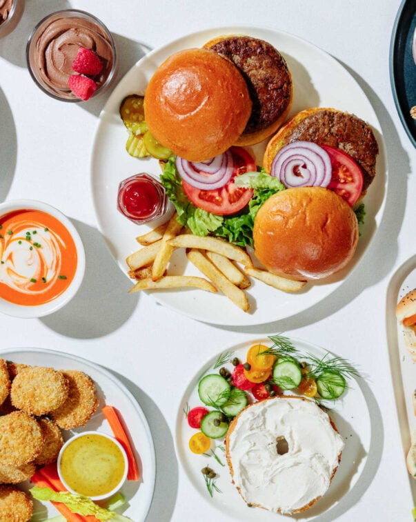 Top down view of a variety of plant based food and condiments on a table