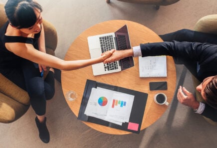 Two colleagues having a business meeting